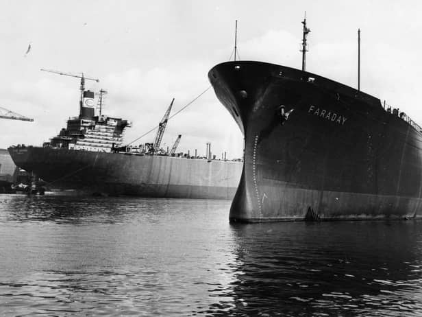 A 1970 photo showing the 253,000-ton giant tanker Esso Hibernia at Wallsend Shipyard, and in the foreground the 22,940-ton liquefied gas carrier Faraday at Hebburn Shipyard.