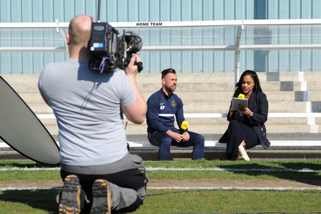 Alex Scott checks her script ahead of her interview with South Shields manager Kevin Phillips