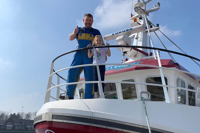 Colin Graham and stepdaughter Daisy on board the Santa Maris.
