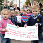 Jarrow's Clervaux Nursery pupils with their cheque for £1,192 raised for Red Nose Day funds.