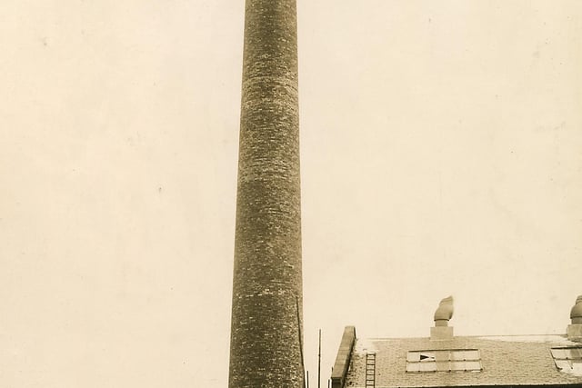 Buxton Advertiser archive, 1925 - less than four months after starting work, the first chimney at Chapel's Ferodo factory is topped off with a lightning conductor