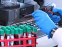 Handout file photo issued by University of Oxford of researchers at the university. Data shows that a coronavirus vaccine developed by AstraZeneca and Oxford University can prevent 70.4% of people from getting Covid-19.