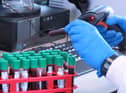 Handout file photo issued by University of Oxford of researchers at the university. Data shows that a coronavirus vaccine developed by AstraZeneca and Oxford University can prevent 70.4% of people from getting Covid-19.