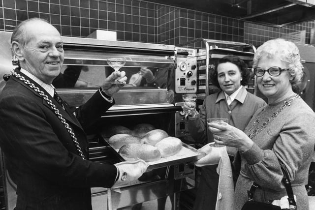 The Mayor and Mayoress of South Tyneside, Coun and Mrs Tom Bell, toast the first batch of bread in champagne at the opening of the new bakery department in Binn's store. With them is the department's manageress, Mrs Muriel Bristow.