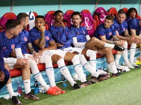England players look on from the bench during the FIFA World Cup Qatar 2022 Round of 16 match between England and Senegal at Al Bayt Stadium on December 04, 2022 in Al Khor, Qatar. (Photo by Julian Finney/Getty Images)