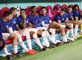 England players look on from the bench during the FIFA World Cup Qatar 2022 Round of 16 match between England and Senegal at Al Bayt Stadium on December 04, 2022 in Al Khor, Qatar. (Photo by Julian Finney/Getty Images)
