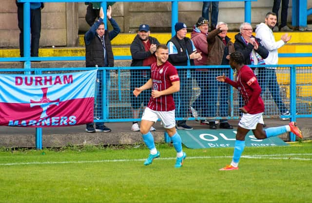 Sam Hodgson celebrates his goal with Joao Gomes. Picture: Ian Kelsey.