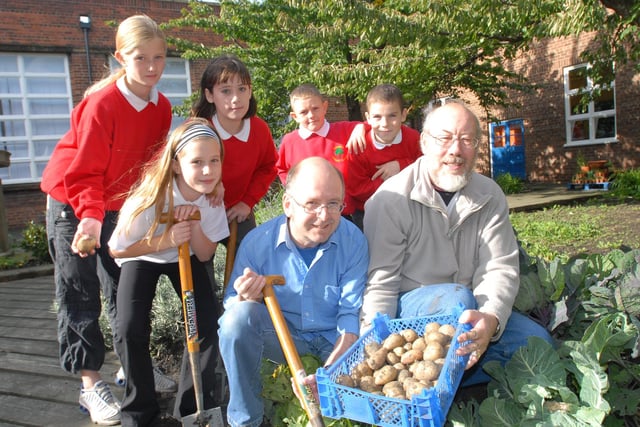 Harvest Festival time in 2006 and these pupils and gardeners at Bedewell School were rightly proud of their produce.