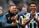 Allan Saint-Maximin of Newcastle United celebrates with Graeme Jones, assistant coach of Newcastle United following their victory in the Carabao Cup Semi Final 2nd Leg match between Newcastle United and Southampton at St James' Park on January 31, 2023 in Newcastle upon Tyne, England. (Photo by Stu Forster/Getty Images)