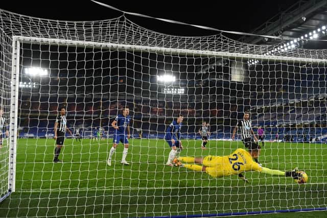 Karl Darlow of Newcastle United fails to save a shot from Timo Werner of Chelsea.