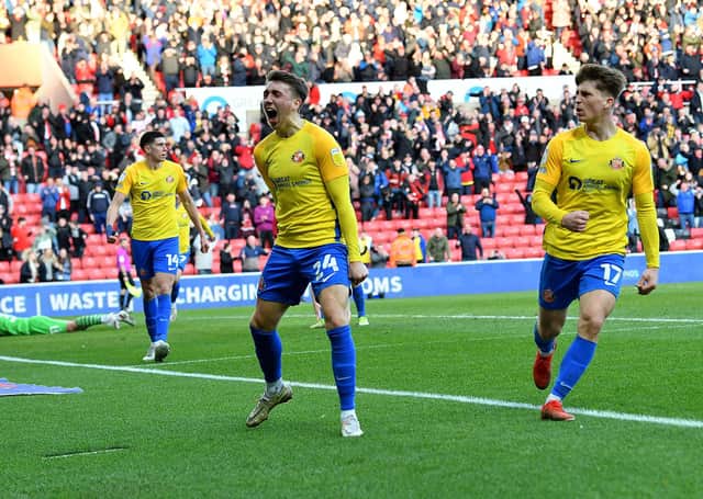 Dan Neil celebrates his goal against Crewe. Picture by FRANK REID.