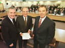 ​Bertie Ahern, Senator George Mitchell and Tony Blair after the signing of the agreement on April 10 1998
