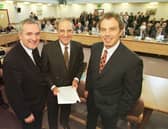 ​Bertie Ahern, Senator George Mitchell and Tony Blair after the signing of the agreement on April 10 1998