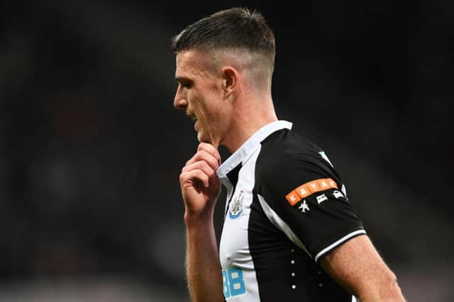 Ciaran Clark leaves the field after being sent off playing for Newcastle United late last year.