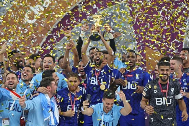 Al Hilal's players celebrate winning the Lusail Super Cup football match between Saudi Arabia's Al-Hilal and Egypt's Zamalek at the Lusail Stadium on the outskirts of Qatar's capital Doha on September 9, 2022. (Photo by Karim JAAFAR / AFP) (Photo by KARIM JAAFAR/AFP via Getty Images)