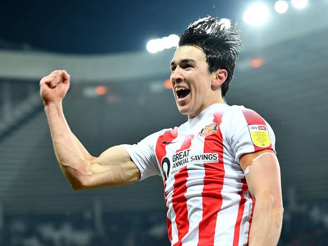 Luke O'Nien celebrates his goal