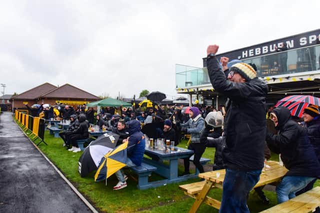 Fans at Hebburn Sports Club react on the final whistle, as the Hornets seal FA Vase victory