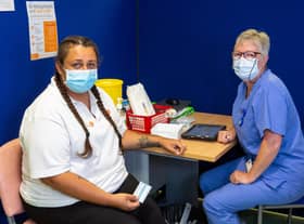 Mikaila Patterson and a vaccinator at The Glen Medical Group