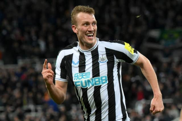 Newcastle United's Dan Burn celebrates his first goal for the club.