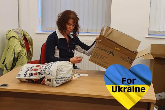 Irene Babrovich prepares items to send to Ukraine.