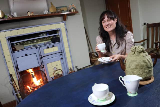 Health and Wellbeing lead, Michelle Kindleyside, enjoys a cup of tea in Orchard Cottage.