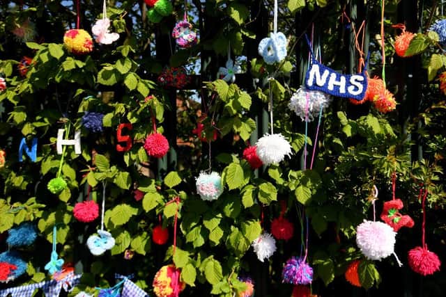 Homemade pompoms showing support for the NHS (Photo: Ross Kinnaird/Getty Images)