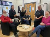 Katherine Mason-Gage manager of the Marsden Home Hub. (Standing centre) with staff Frank, Janet, Sherina, Margaret and Janet Picture by FRANK REID'