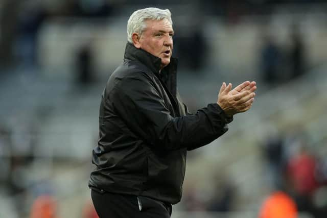 Steve Bruce applauds Newcastle United fans.