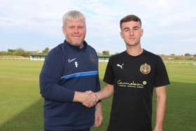 Dan Martin is pictured with South Shields manager Graham Fenton.