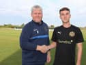 Dan Martin is pictured with South Shields manager Graham Fenton.