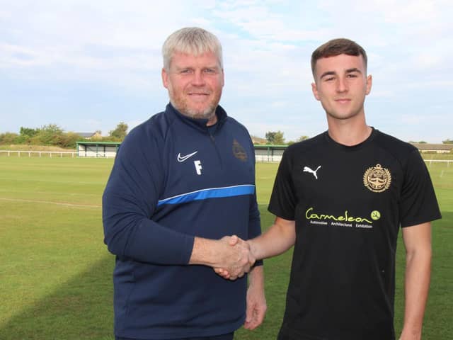 Dan Martin is pictured with South Shields manager Graham Fenton.