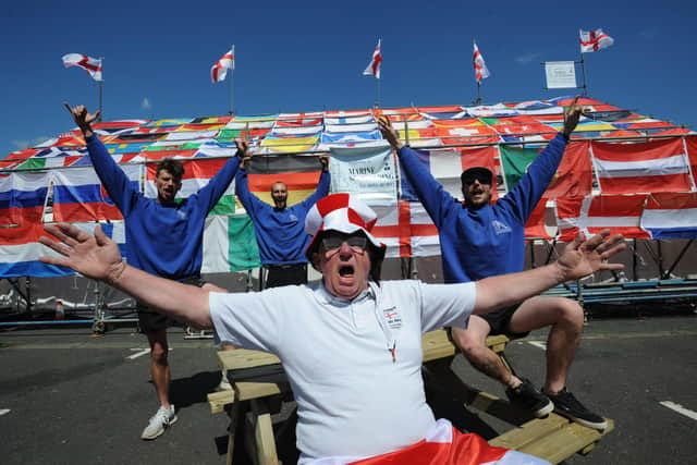 Norman Scott of Dougie's Tavern has prepared for the Euros with help from (from left) JJ Mullen, Tom Mullen and Chris White of Marine Scaffolding. JPI image.