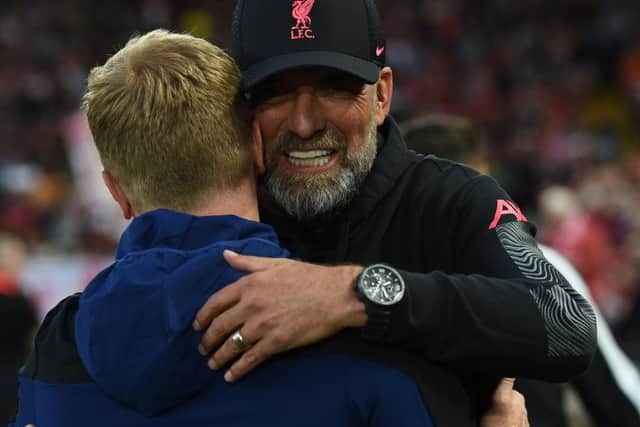 Liverpool manager Jurgen Klopp embraces his Newcastle United counterpart Eddie Howe at Anfield earlier this season.