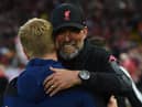 Liverpool manager Jurgen Klopp embraces his Newcastle United counterpart Eddie Howe at Anfield earlier this season.