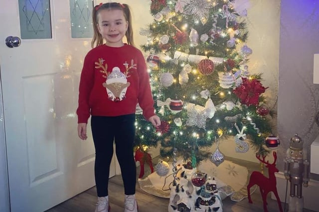 Savannah Brennan, age 6, brings some magic and sparkle to proceedings with her glittery reindeer jumper.