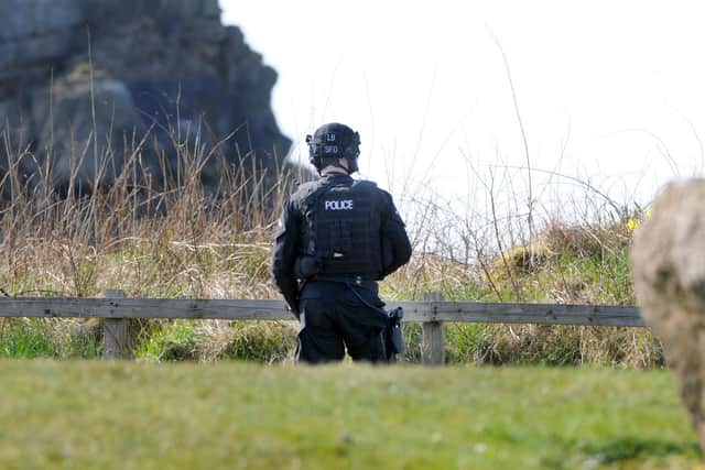 Armed responce officer at Old Marsden Quarry during man hunt