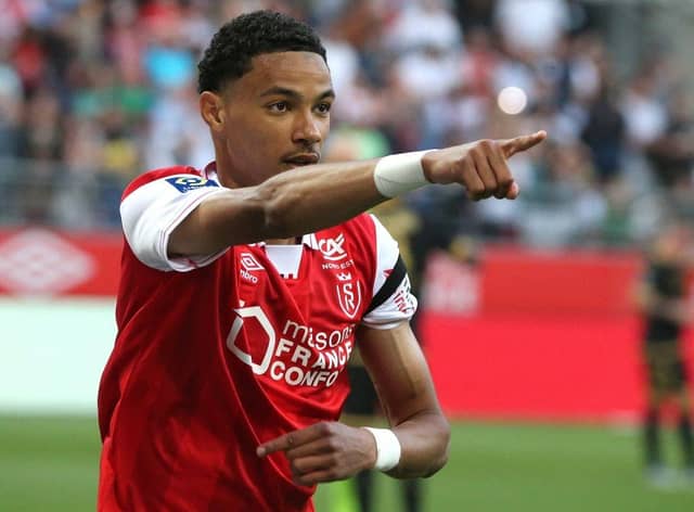 Stade de Reims forward Hugo Ekitike celebrating a goal last season.