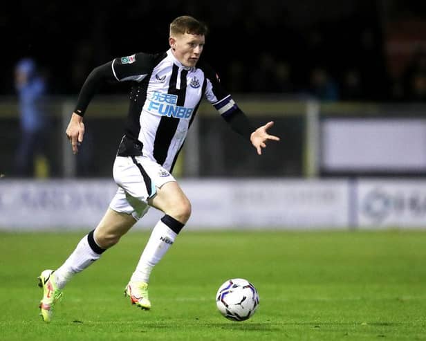 Elliot Anderson of Newcastle United runs with the ball during the Papa John's EFL Trophy Group match between Harrogate Town and Newcastle United U21's at The EnviroVent Stadium on October 05, 2021 in Harrogate, England. (Photo by George Wood/Getty Images)