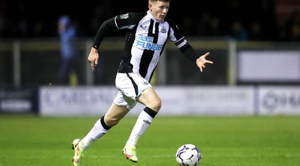 Elliot Anderson of Newcastle United runs with the ball during the Papa John's EFL Trophy Group match between Harrogate Town and Newcastle United U21's at The EnviroVent Stadium on October 05, 2021 in Harrogate, England. (Photo by George Wood/Getty Images)