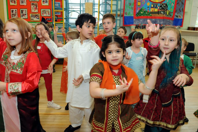 Pupils enjoyed a day of Indian topics including dancing 9 years ago. Is there someone you know in this photo?