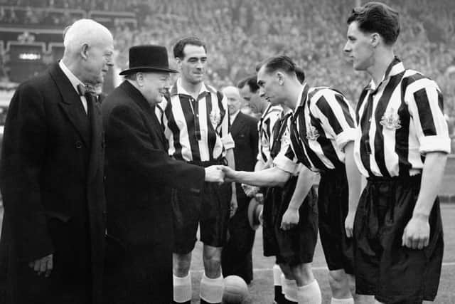 Winston Churchill, being introduced to Jackie Milburn and the Newcastle United team by Joe Harvey the Newcastle United captain at Wembley, before the FA Cup final against Arsenal. PA Photo.