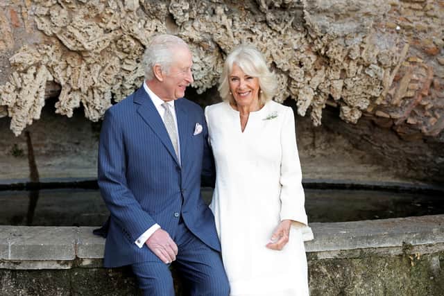 Handout photo issued by Buckingham Palace of King Charles III and Queen Camilla posing for a portrait next to the Neronian spur of the Aqua Claudia at Villa Wolkonsky, Rome, Italy, ahead of their 20th wedding anniversary on Wednesday