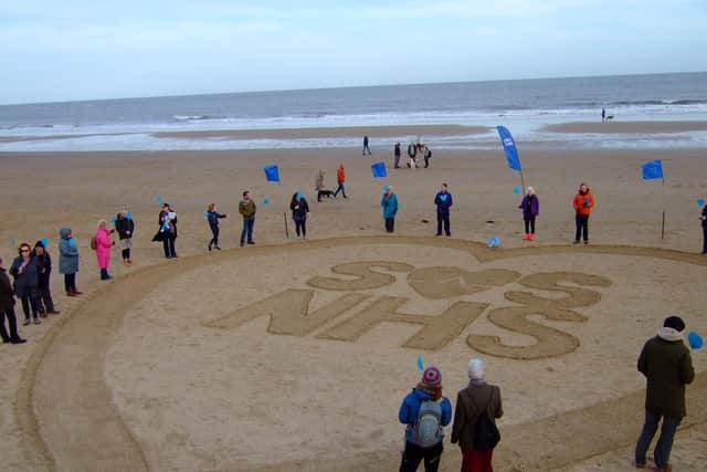 Campaigners mark SOS-NHS day of action on coast.