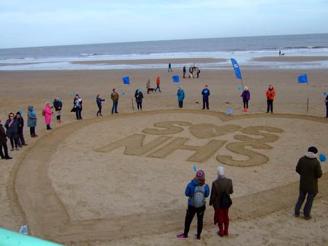Campaigners mark SOS-NHS day of action on coast.