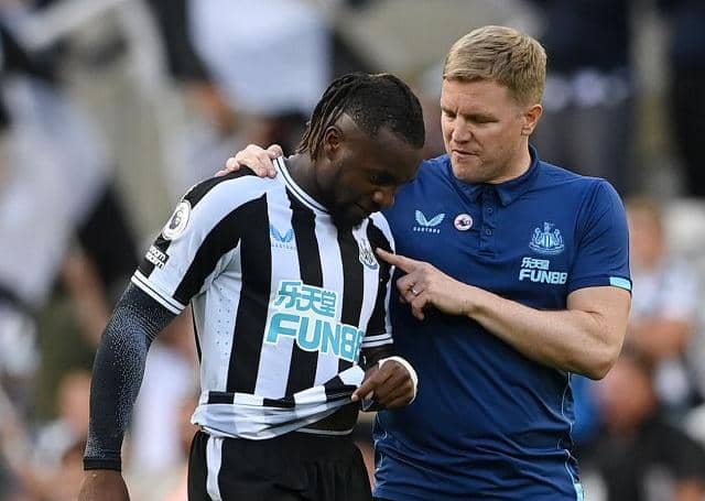 Allan Saint-Maximin of Newcastle United talks with Eddie Howe, Manager of Newcastle United, after the final whistle of the Premier League match between Newcastle United and Manchester City at St. James Park on August 21, 2022 in Newcastle upon Tyne, England. (Photo by Stu Forster/Getty Images)