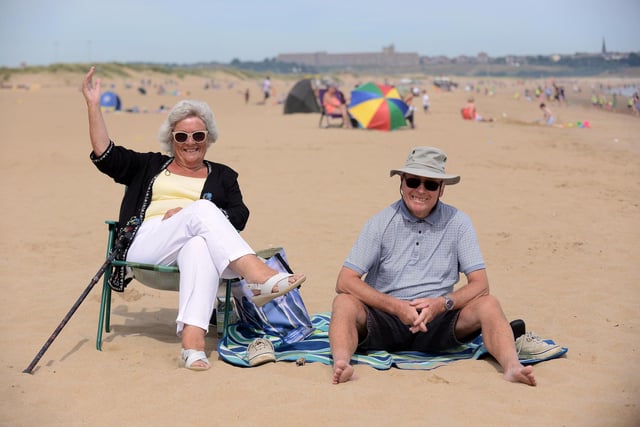 Pat and Dennis Hardingham enjoy the sun at Sandhaven beach