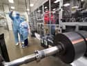 Workers at the Envision AESC UK Ltd battery plant based at Nissan in Sunderland where batteries for the Nissan Leaf are produce. The Japanese car giant Nissan has announced that they are to build a new electric model and huge battery plant in the UK in a massive boost to the automotive industry.