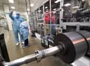 Workers at the Envision AESC UK Ltd battery plant based at Nissan in Sunderland where batteries for the Nissan Leaf are produce. The Japanese car giant Nissan has announced that they are to build a new electric model and huge battery plant in the UK in a massive boost to the automotive industry.