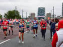 An iconic view as the runners cross the Tyne Bridge.