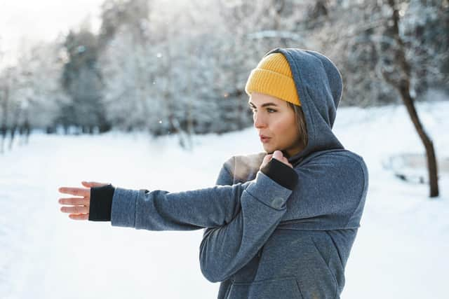 Stretching before and after exercise is among the saftey tips (photo: Adobe)